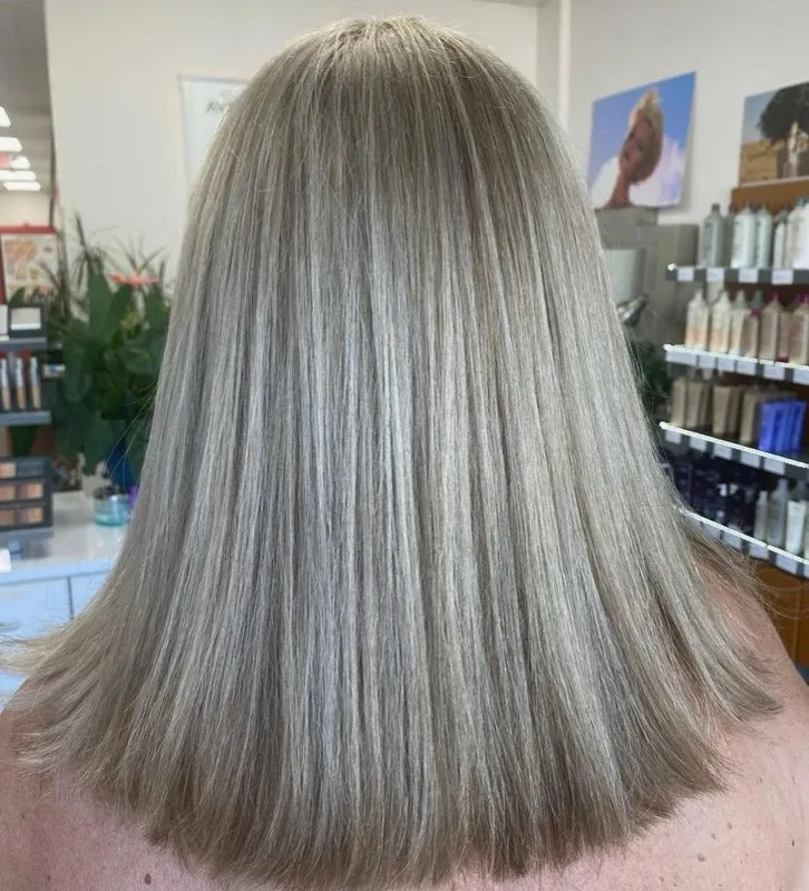 Ash blonde straight hair styling