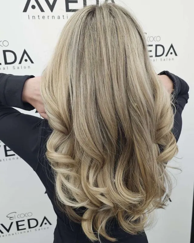 Soft blonde curls styling