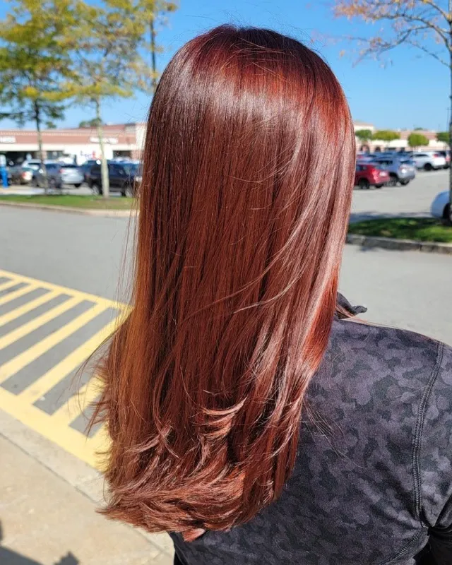 Copper red hair color, natural light