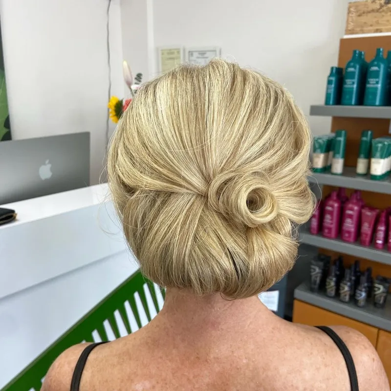 Elegant blonde updo styling